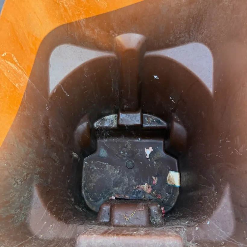 Dirty trash bin before cleaning in San Antonio